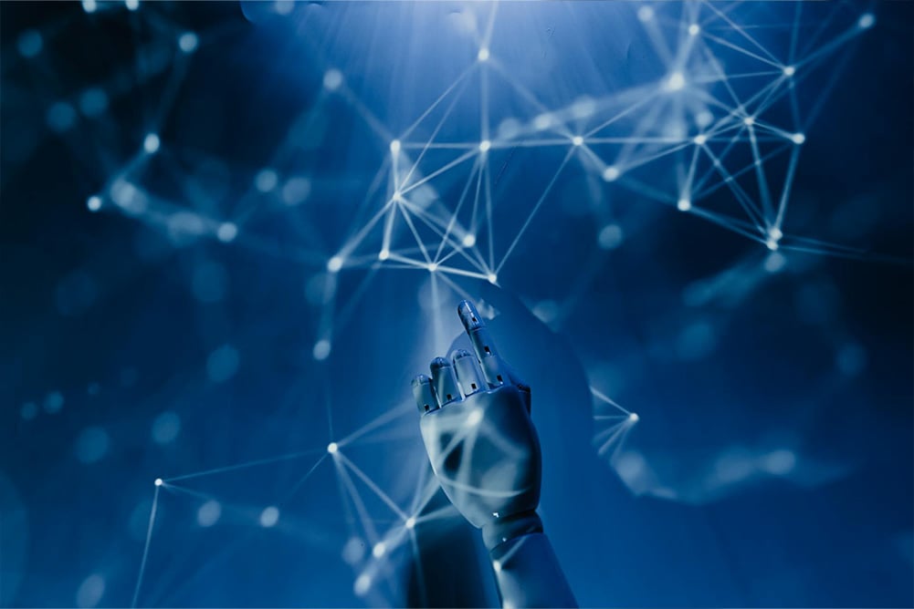 A robotic hand reaching toward a glowing digital network, symbolizing the intersection of artificial intelligence, machine learning, and data-driven procurement systems.
